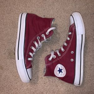 Maroon high-top converse